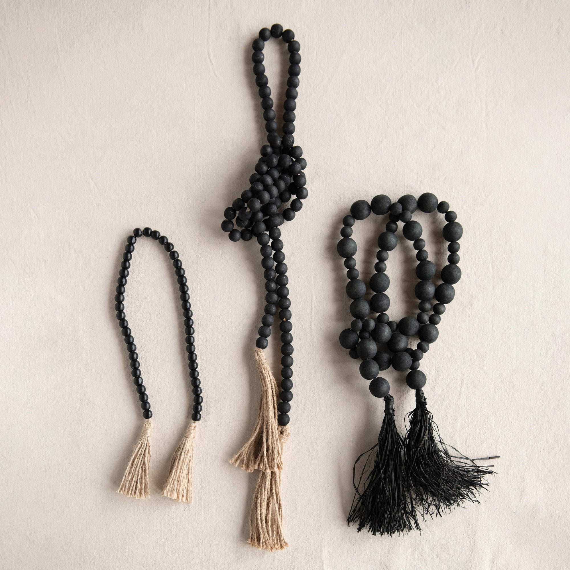 Black Acacia Wood Bead Garland w/Jute tassels