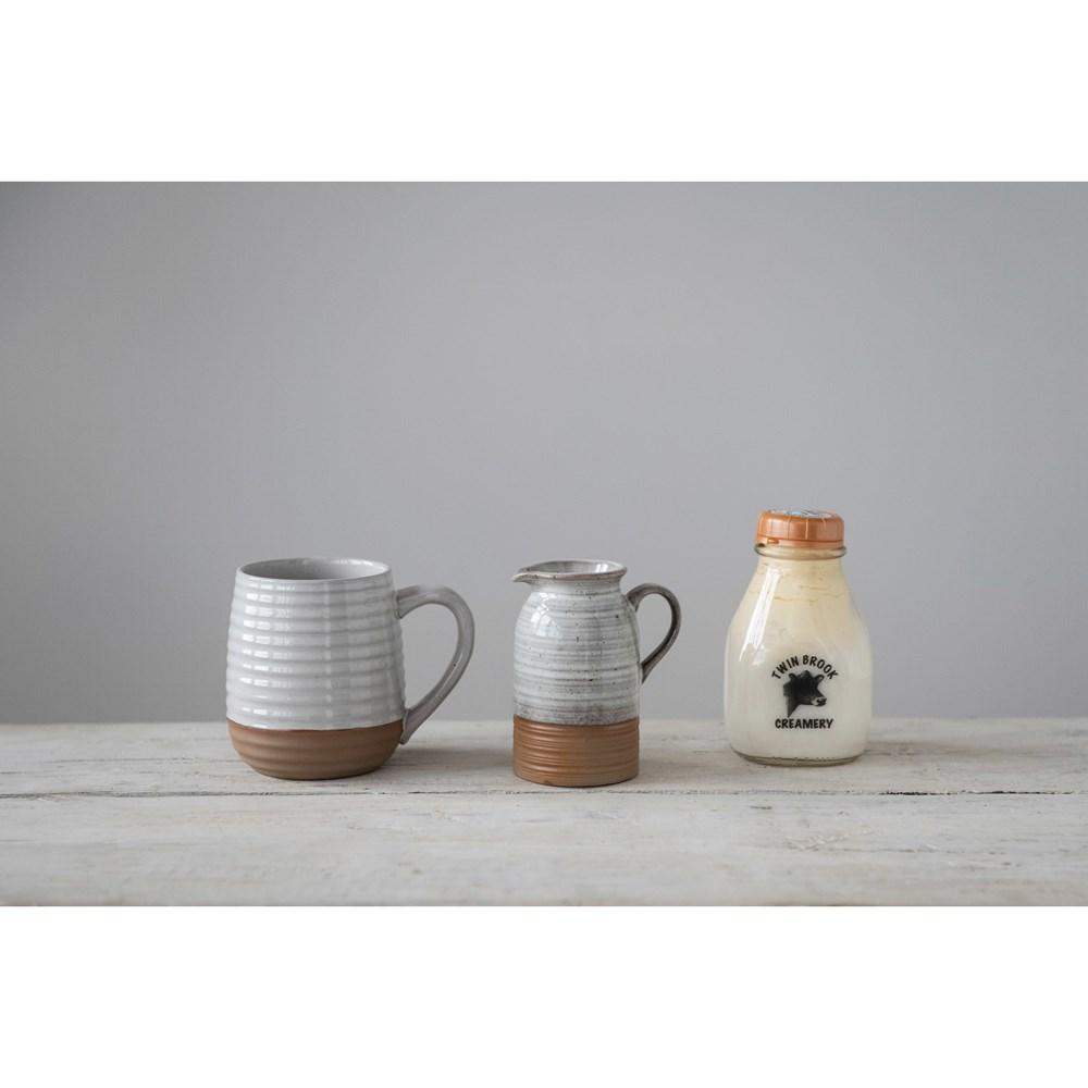Ivory & Tan Stoneware Creamer w/Reactive Glaze