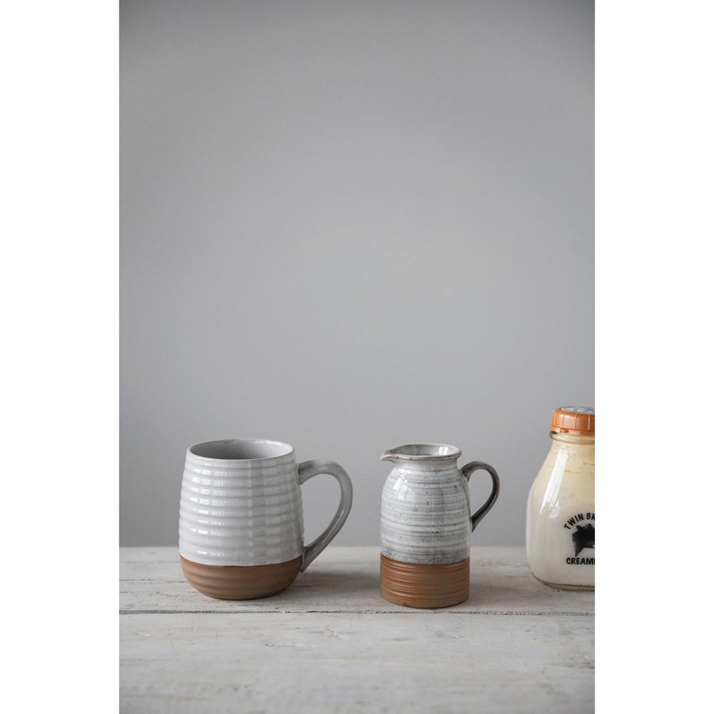 Ivory & Tan Stoneware Creamer w/Reactive Glaze
