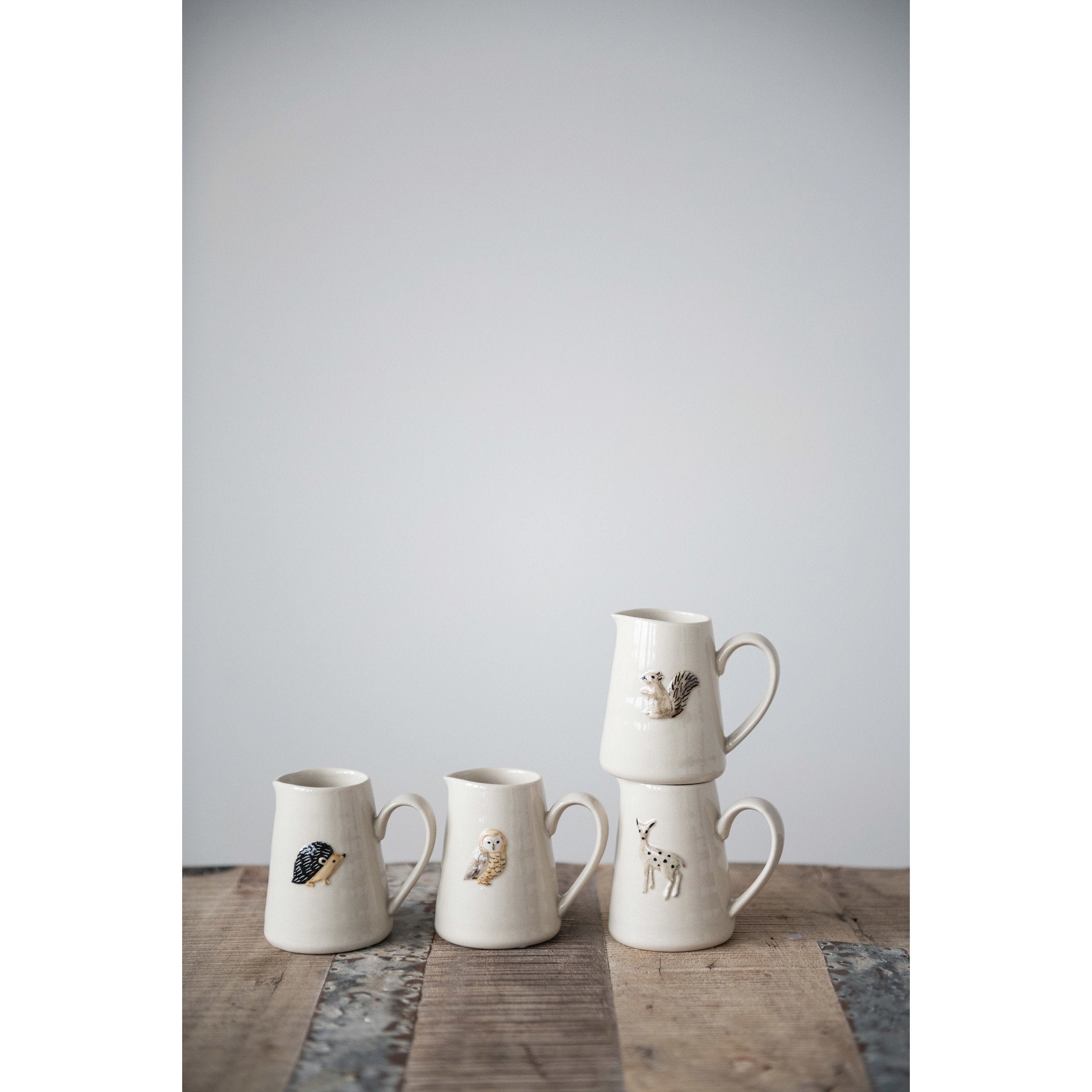 Hand-Painted Embossed Stoneware Creamer w/Forest Animal