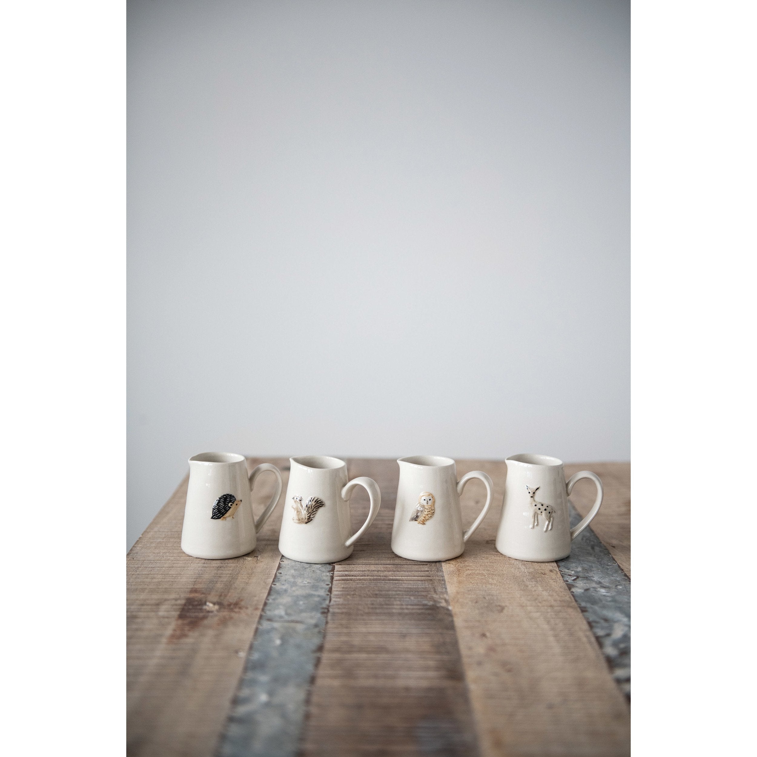 Hand-Painted Embossed Stoneware Creamer w/Forest Animal
